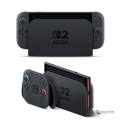 Nintendo Switch V2 — console with Joy-Con controllers attached while placed in charging dock, and also console charging in dock with Joy-Con controller standing separately